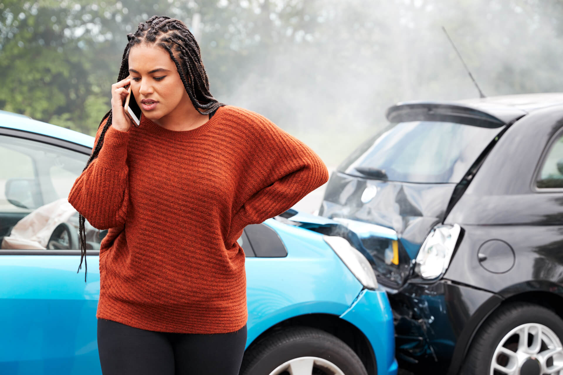 Female Motorist Involved In Car Accident Calling Insurance Company Or Recovery Service